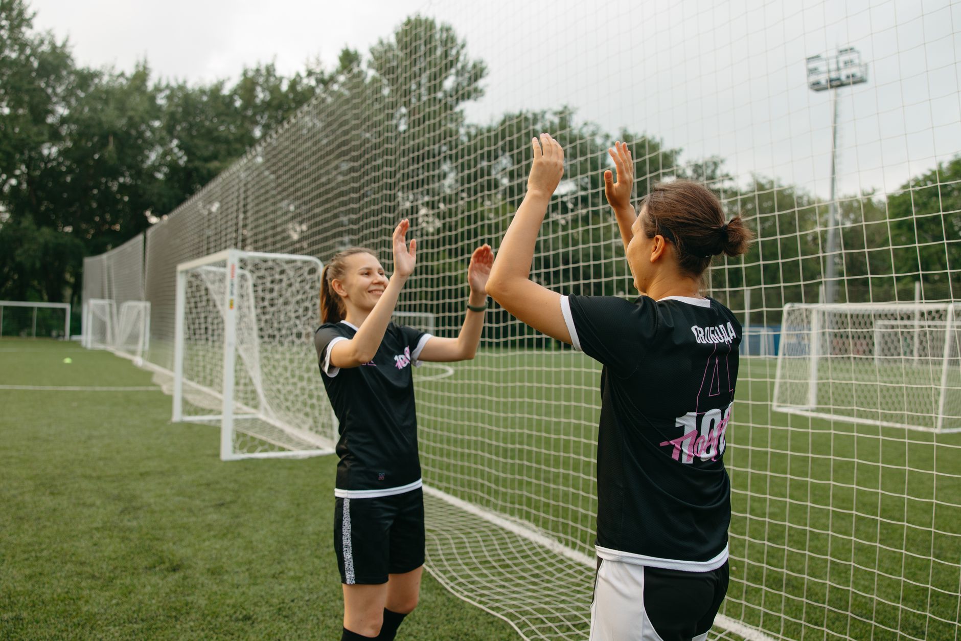 Team sport athlete practicing for Best school team license platform for offseason training.